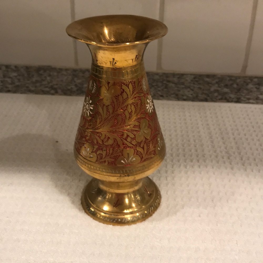A solid brass vase